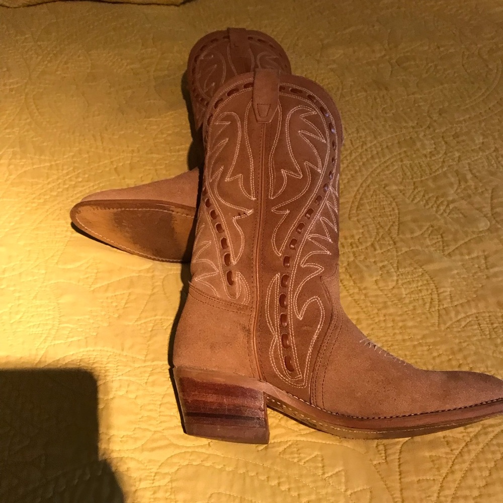 Tan leather cowboy boots.